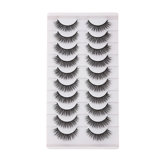 Set of false eyelashes on a white card with a grid pattern