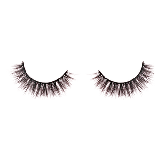 Pair of black false eyelashes on a white background