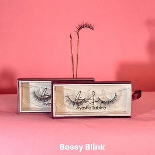 Eyelash packaging with 'Ayesha Sabina' branding on a pink background