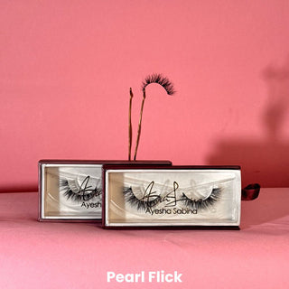 Eyelash packaging with lashes on a pink background