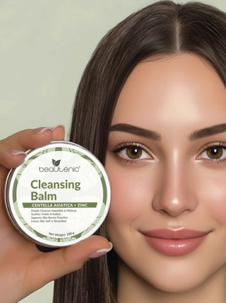 Person holding a container of 'beautenic' Cleansing Balm with a neutral background