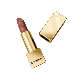 Burberry lipstick with gold case on a white background