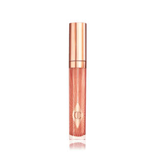 Rose gold lip gloss tube on a transparent background