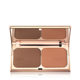 Makeup palette with brown shades on a white background