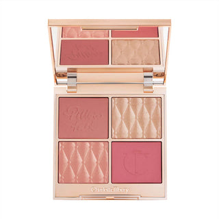 Makeup palette with various shades of blush and bronzer on a white background