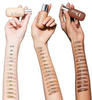 Dior makeup products with swatches on a white background