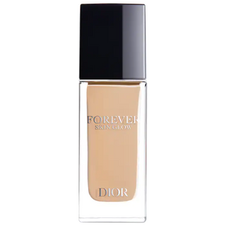 Dior foundation bottle with black cap on a white background