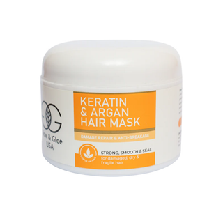 Keratin and Argan hair mask jar with orange label on a white background