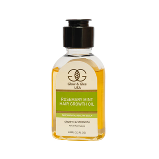 Bottle of Glow & Glee USA Rosemary Mint Hair Growth Oil on a white background