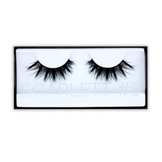 Pair of false eyelashes in a black and white box with 'Scarlett' branding.