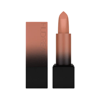 Lipstick with ombre design and 'Huda Beauty' branding on a white background
