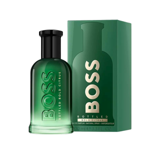 Green BOSS bottled perfume with packaging on a white background