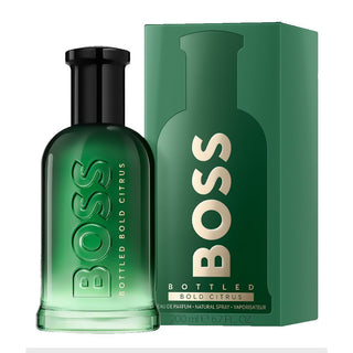 Green BOSS bottled perfume with packaging on a white background