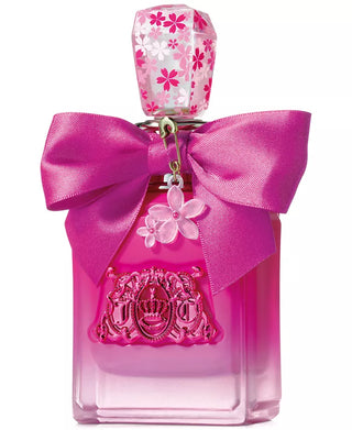 Pink perfume bottle with a decorative bow and floral design on the cap against a white background