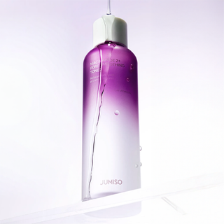 Purple and white bottle with gradient design on a light gray background