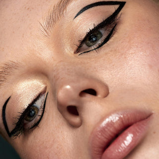 Close-up of a person's eyes with dramatic makeup