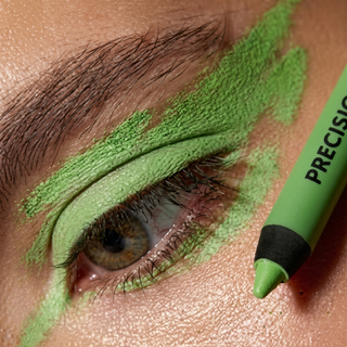 Close-up of an eye with green makeup and a green eyeliner pencil labeled 'Precision'.