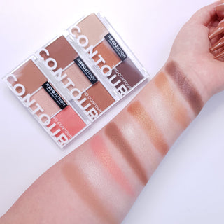 Makeup product with swatches on a hand against a white background