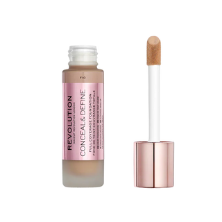 Revolution Conceal & Define foundation bottle with applicator on a white background