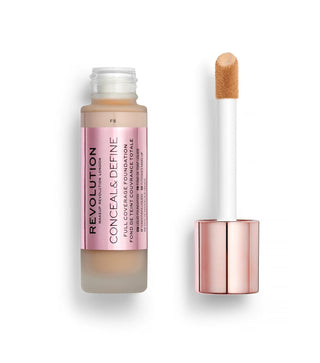 Revolution Conceal & Define foundation bottle with applicator on a white background