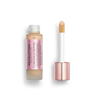 Revolution makeup concealer bottle with applicator on a white background