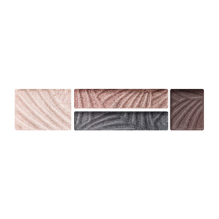 Set of four eyeshadow pans with different shades on a white background
