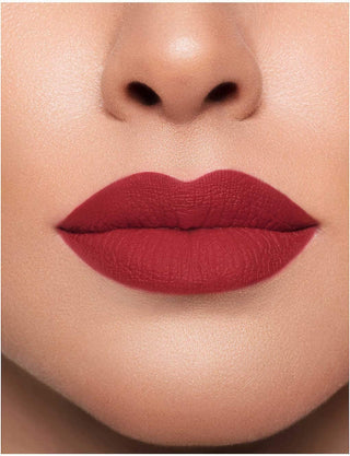 Close-up of a person's lips wearing a red lipstick.