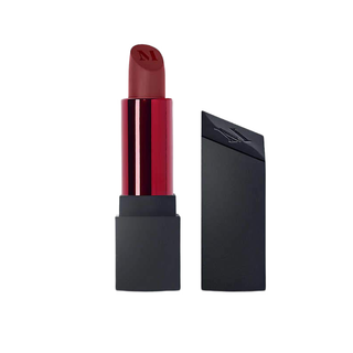 Red lipstick with black casing on a white background