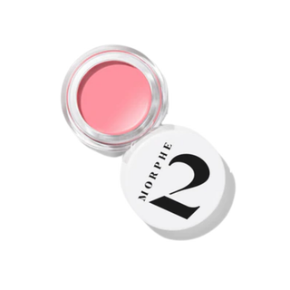 Pink lip cream in a Morphe 2 container on a white background