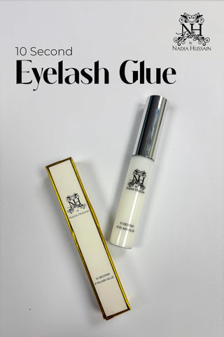 Eyelash glue with packaging on a white background