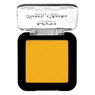 Compact yellow makeup powder with black case on a white background