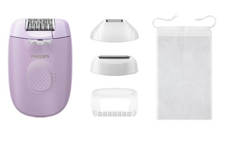 Purple Philips epilator with attachments on a white background