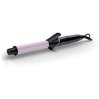 Hair curling iron with pink barrel on a white background