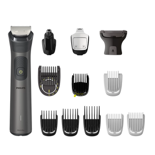 Philips grooming kit with various attachments on a white background
