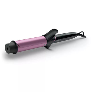 Pink and black hair curler on a white background