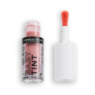 Lip tint with applicator and 'Revolution' branding on a white background