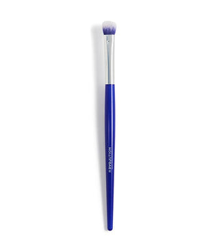 Makeup brush with blue handle and white bristles on a white background
