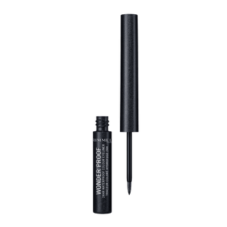Rimmel Wonder Proof eyeliner pen on a green background
