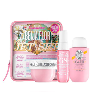 Belja Flor beauty product set with pink and white packaging on a white background