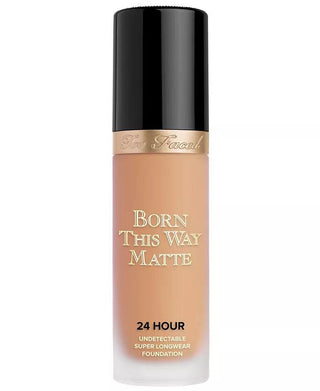 Foundation bottle with 'Born This Way Matte' text on a white background