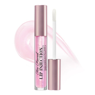 Too Faced Lip Injection Maximum Fluid lip gloss with applicator on a white background