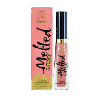 Tea Faced Melted Latex lip gloss with packaging on a white background