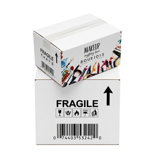 Makeup mystery box with 'Fragile' labels on a white background